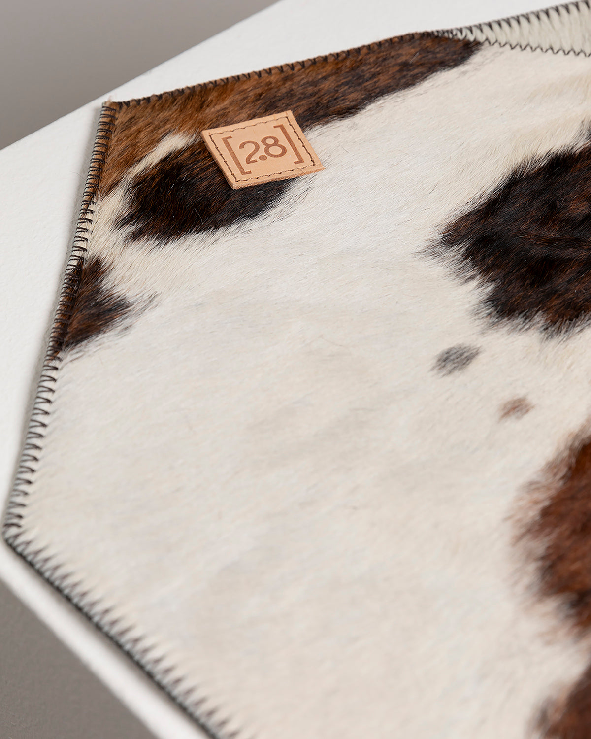 DAVID COWHIDE DOG PLACEMAT | פלייסמט לקערות לכלבים